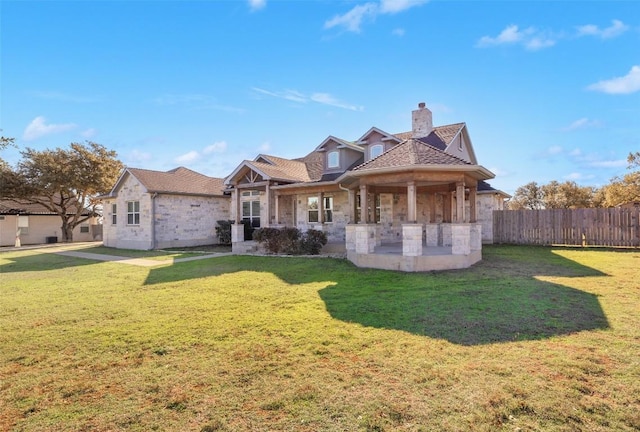 view of front of property with a front yard