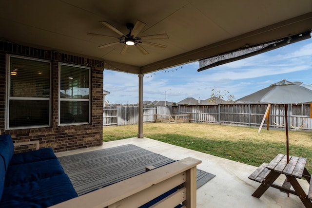 view of patio featuring ceiling fan and a fenced backyard