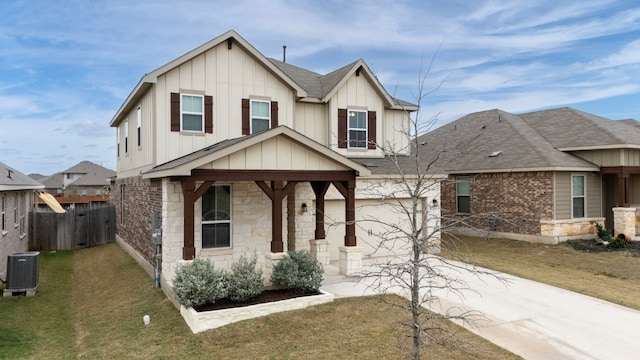 view of front of property featuring covered porch, central AC, and a front yard