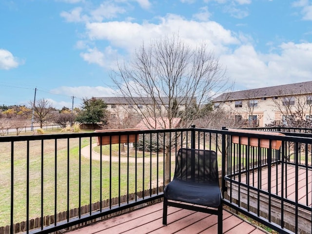 deck featuring a yard