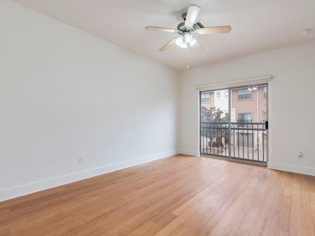 empty room featuring light hardwood / wood-style floors and ceiling fan