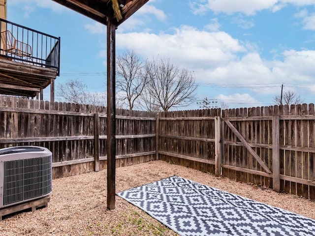 view of yard with central AC