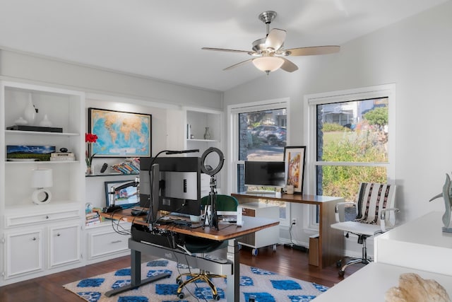 office featuring dark hardwood / wood-style flooring, built in shelves, lofted ceiling, and ceiling fan