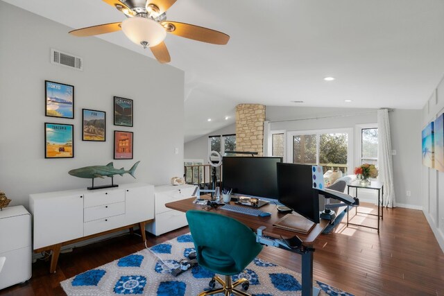 office with ceiling fan, dark hardwood / wood-style flooring, vaulted ceiling, and ornate columns