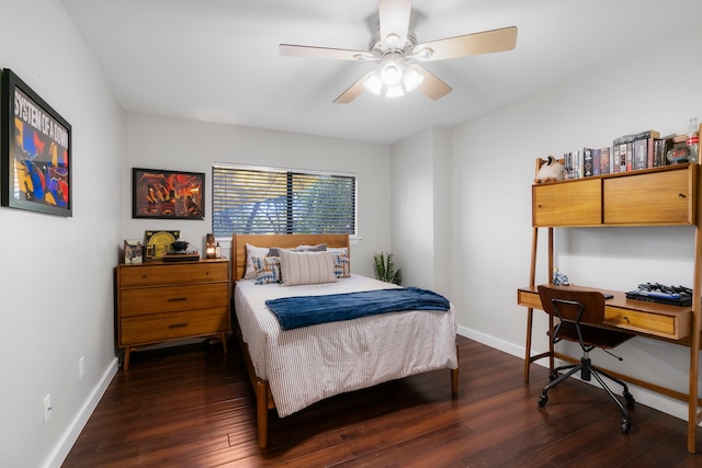 bedroom with dark wood-type flooring and ceiling fan