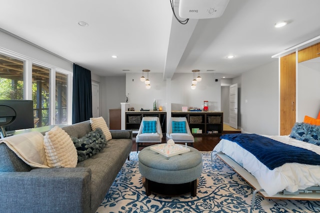 bedroom with wood-type flooring and beamed ceiling