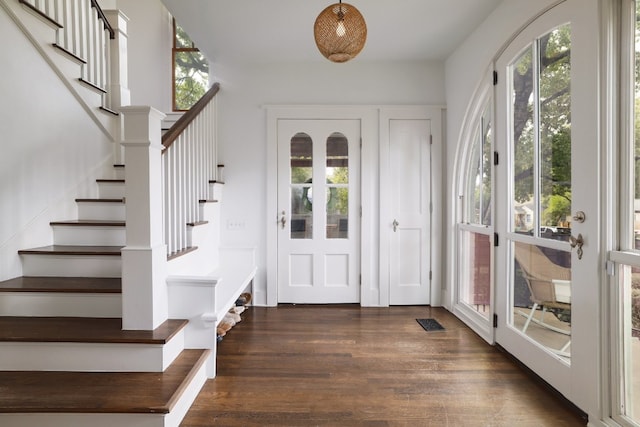 foyer featuring dark hardwood / wood-style floors