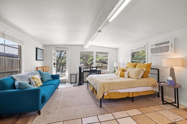 bedroom with access to exterior, light tile patterned floors, beamed ceiling, and a wall mounted air conditioner