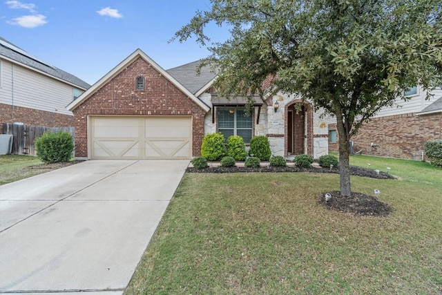 view of front facade featuring a garage and a front lawn