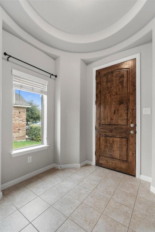 view of tiled foyer entrance