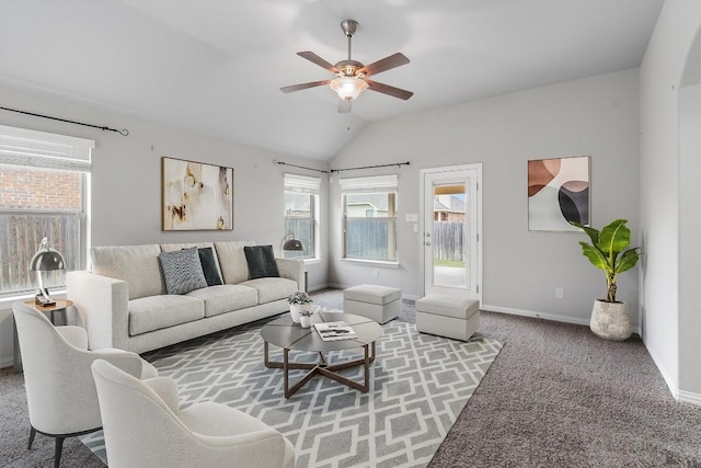 living room with carpet, vaulted ceiling, and ceiling fan