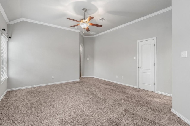 empty room featuring ceiling fan, carpet, and ornamental molding