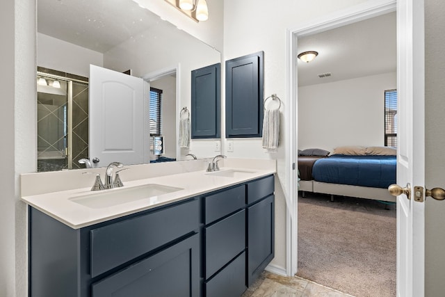 4429 Venticano Pl, Round Rock, TX 78665 - ensuite bathroom with double vanity and an enclosed shower