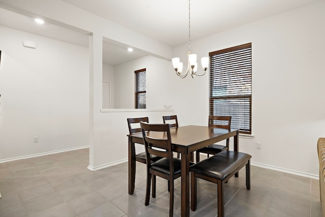 dining area featuring a chandelier