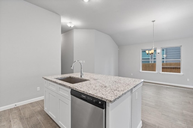 kitchen with sink, hanging light fixtures, stainless steel dishwasher, a center island with sink, and white cabinets