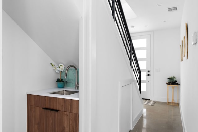 interior space featuring sink and plenty of natural light