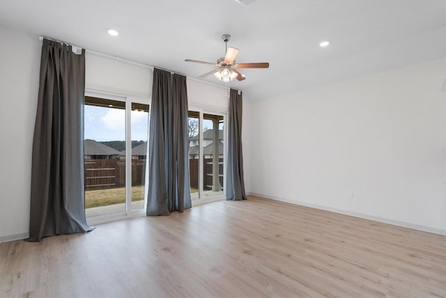 unfurnished room with recessed lighting, baseboards, wood finished floors, and ceiling fan