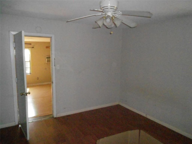 spare room with ceiling fan and hardwood / wood-style floors