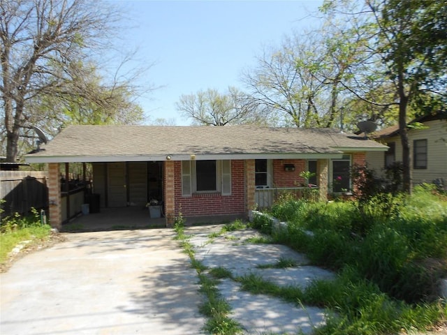 ranch-style home with a carport