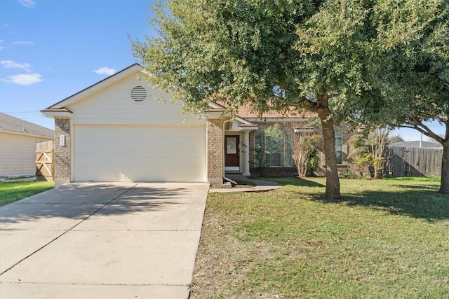 ranch-style home with a front lawn and a garage