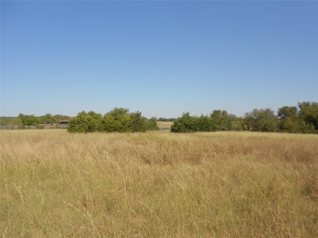 view of landscape with a rural view