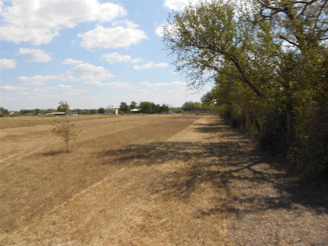 exterior space with a rural view