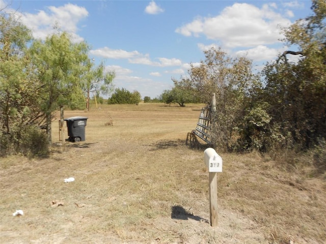 exterior space with a rural view