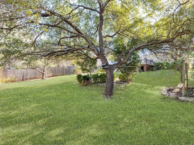 view of yard with fence