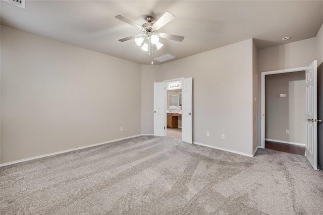 unfurnished bedroom with carpet floors and ceiling fan