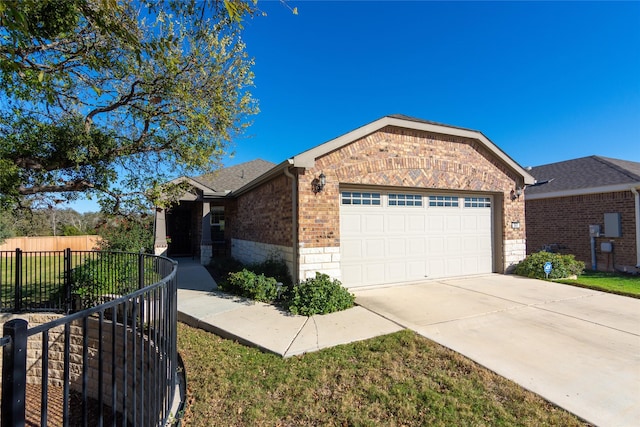 view of front of home featuring a garage