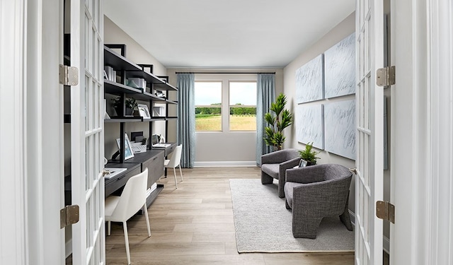 office area with light wood-type flooring