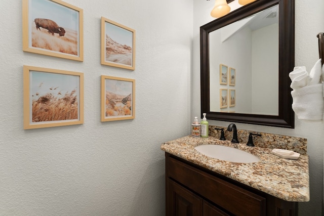 bathroom featuring vanity