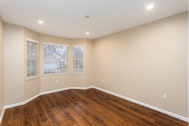 unfurnished room featuring wood-type flooring