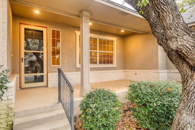 entrance to property with covered porch