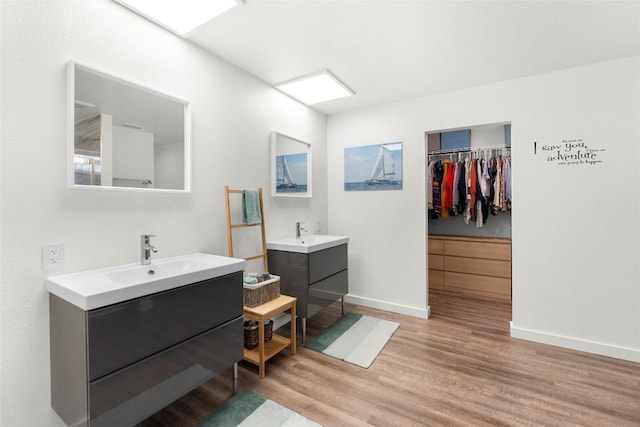 bathroom featuring vanity and hardwood / wood-style flooring