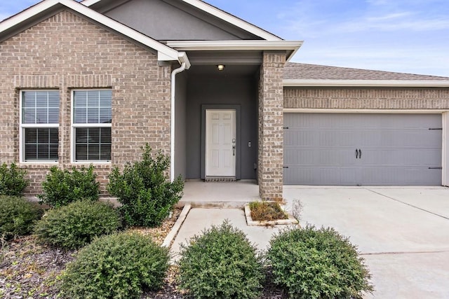 ranch-style house featuring a garage