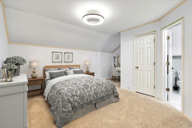 bedroom with light colored carpet and lofted ceiling