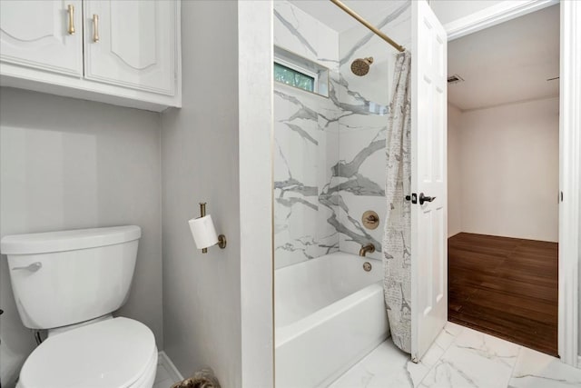 bathroom with shower / bathtub combination with curtain and toilet