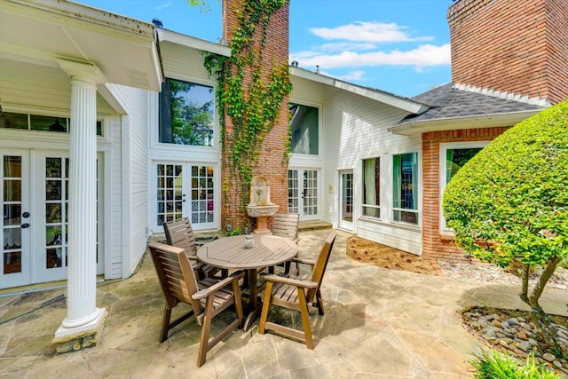 view of patio featuring french doors