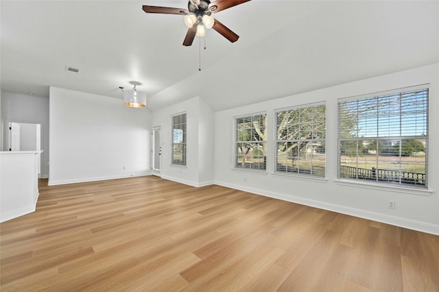 unfurnished living room with ceiling fan and light hardwood / wood-style floors