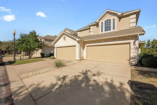 view of front of property with a garage