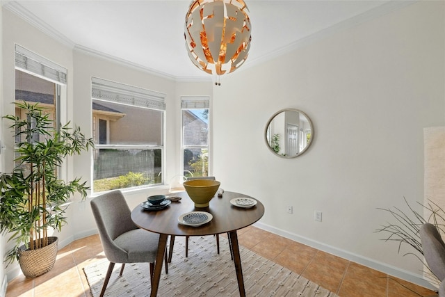 dining area with a healthy amount of sunlight, crown molding, and light tile patterned flooring