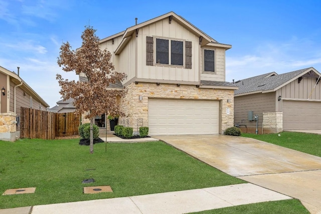 view of front of home featuring a garage and a front lawn