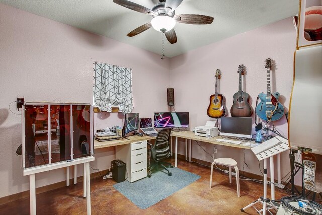 office featuring ceiling fan and concrete flooring