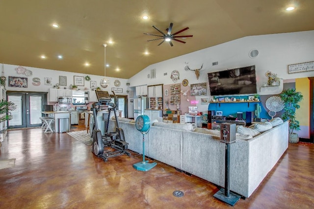 living room featuring ceiling fan, french doors, concrete floors, and vaulted ceiling