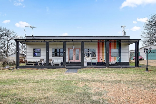 view of front of home featuring a porch and a front yard