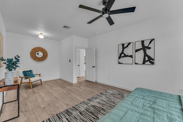 bedroom featuring ceiling fan and light hardwood / wood-style flooring