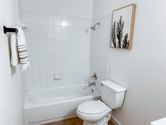 177 Oxford Dr, Kyle, TX 78640 - bathroom with toilet and washtub / shower combination