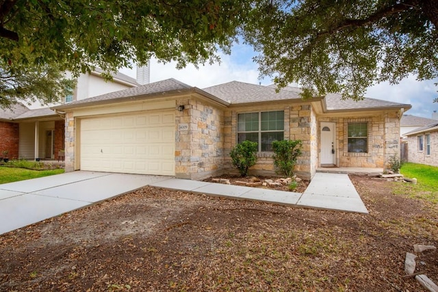 ranch-style house featuring a garage