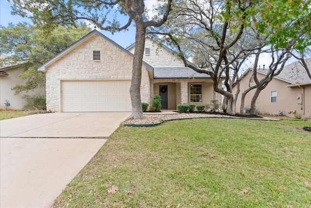 view of front facade with a garage and a front yard